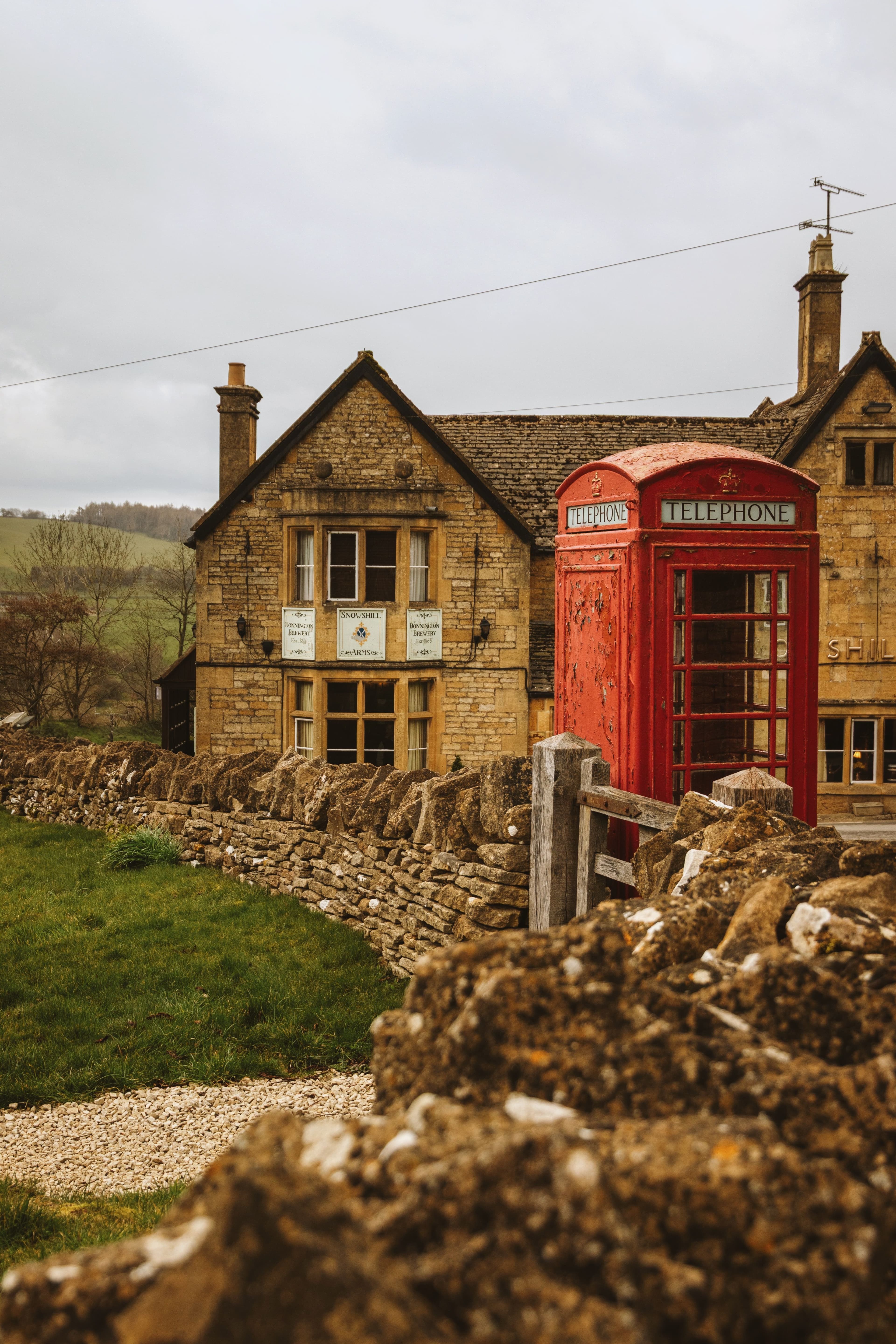 Stone cottages below the Cotswold escarpment, Snowshill
